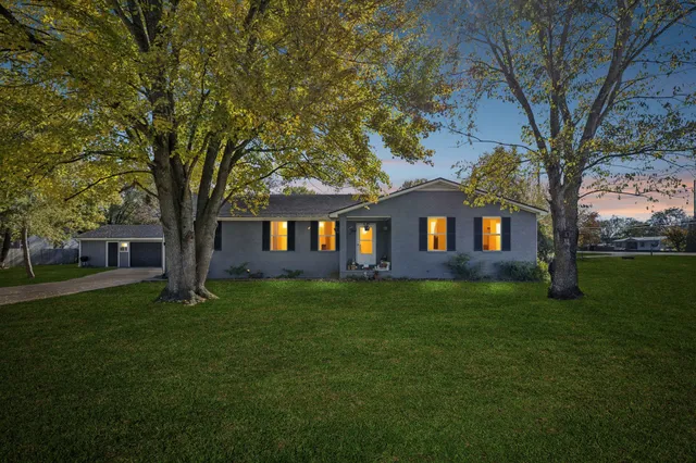 a view of a house with a big yard