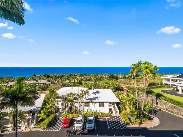a view of a chairs and table in a patio