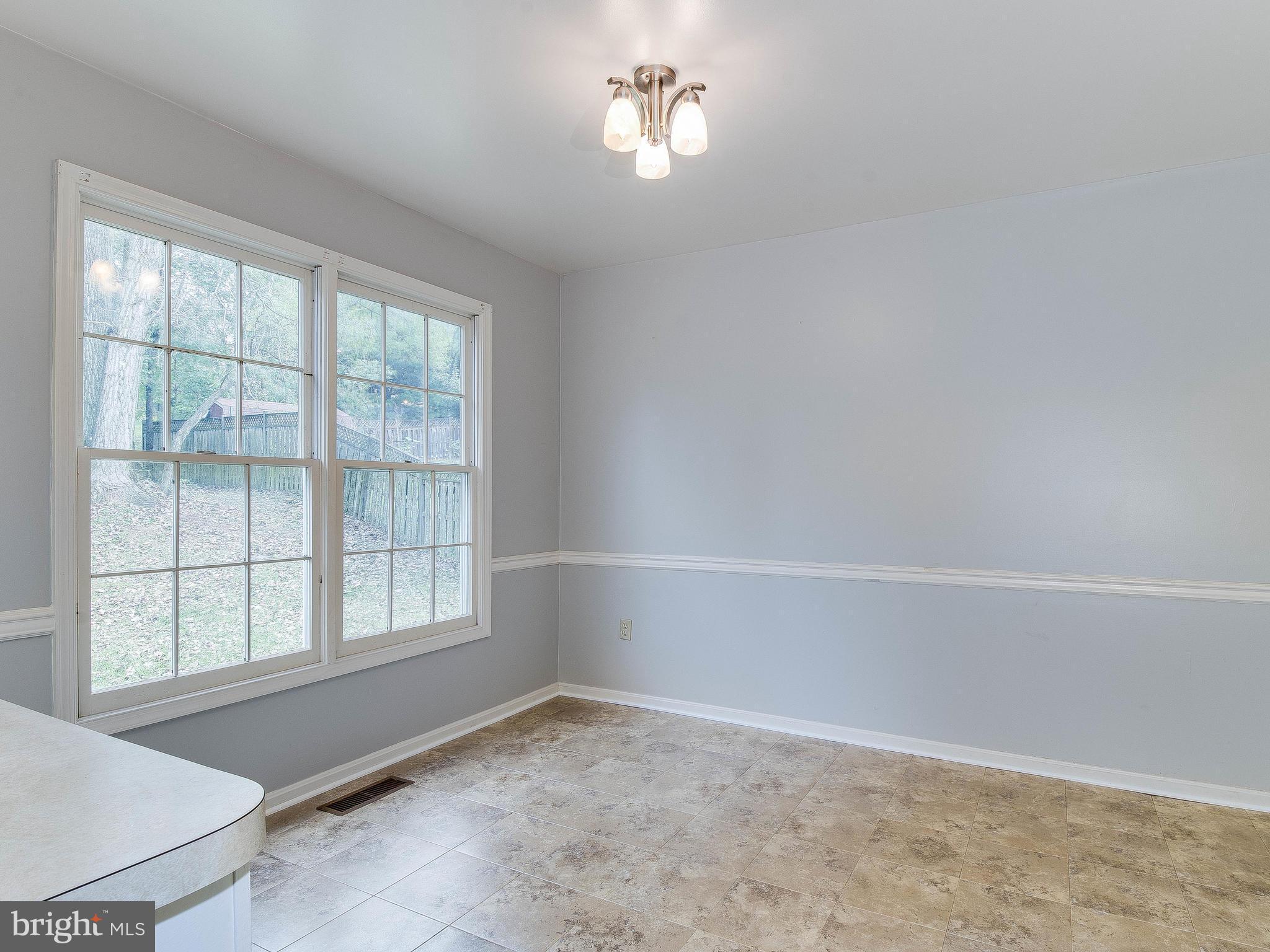 13805 Turnmore Road Silver Spring, MD 20906 - Photo 13 of 29 an empty room with a window
