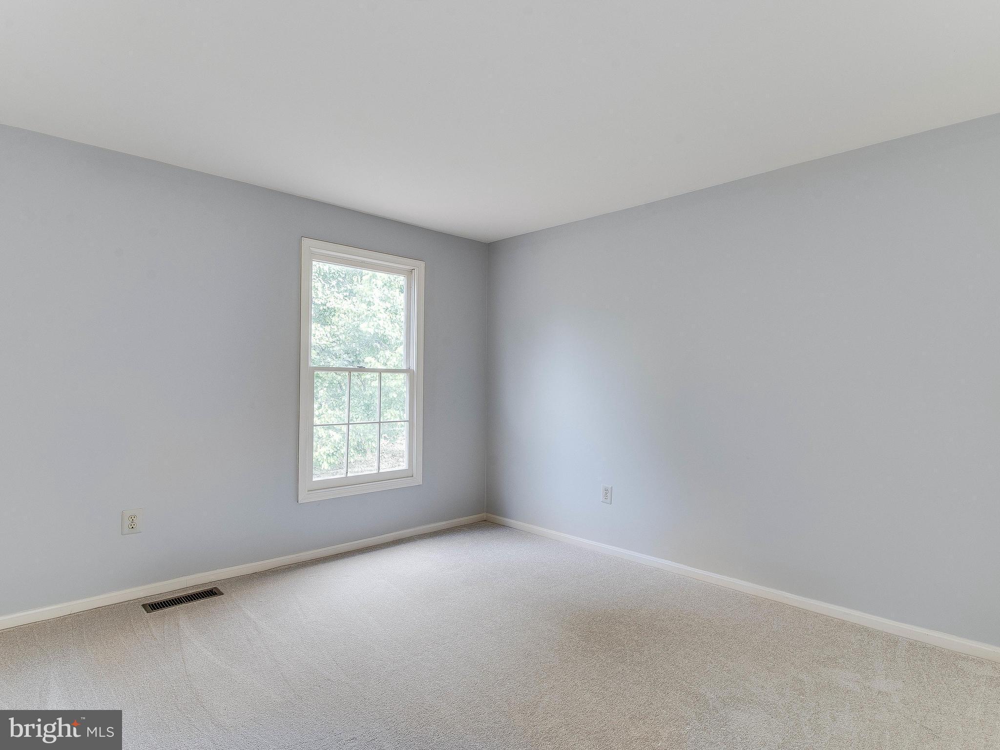 13805 Turnmore Road Silver Spring, MD 20906 - Photo 18 of 29 an empty room with windows