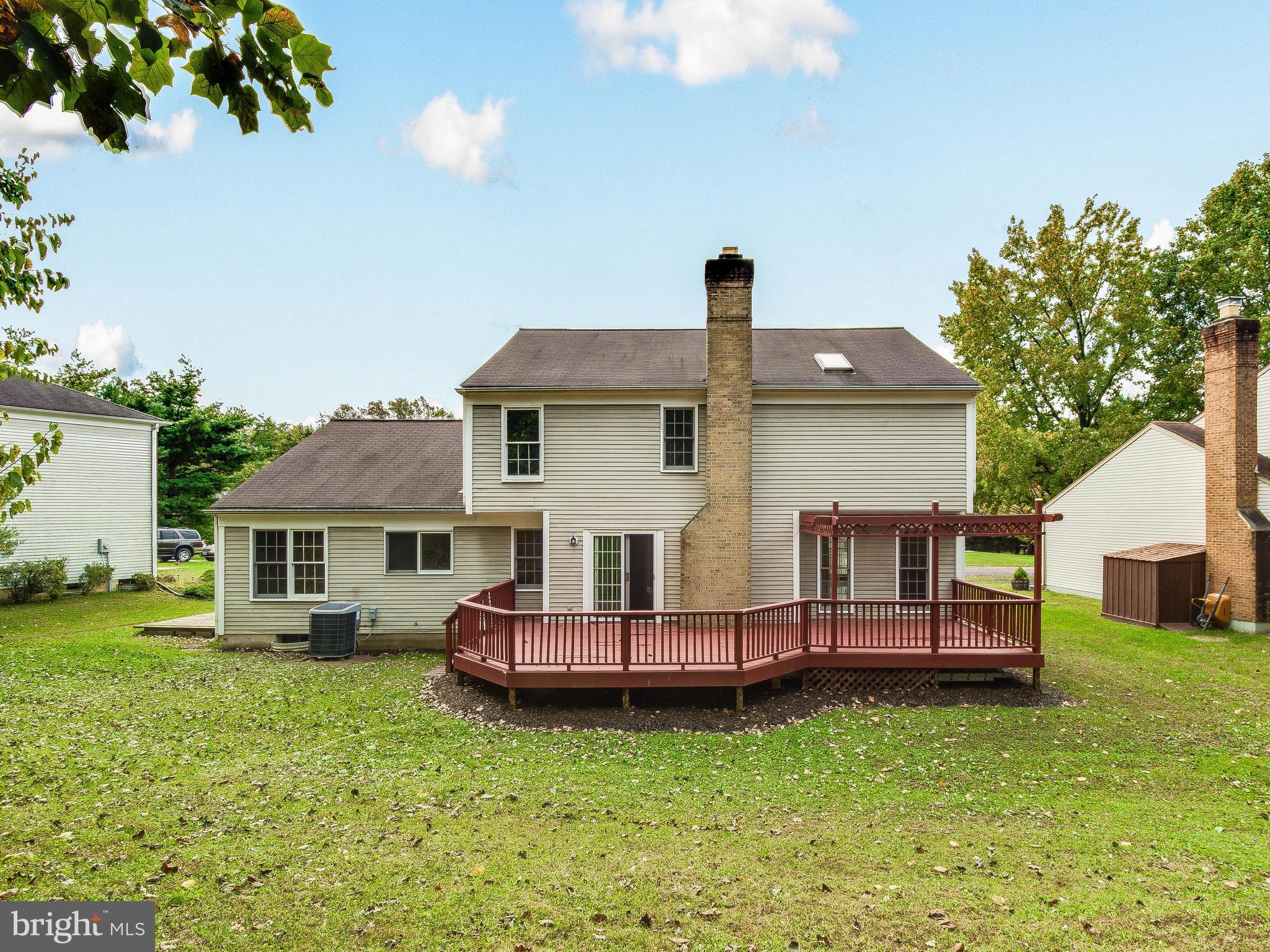 13805 Turnmore Road Silver Spring, MD 20906 - Photo 29 of 29 a front view of a house with a yard table and chairs
