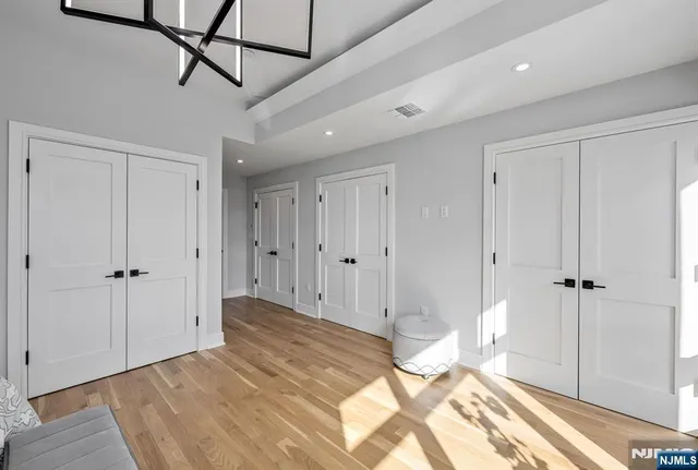 a view of a bathroom with a bathtub and shower