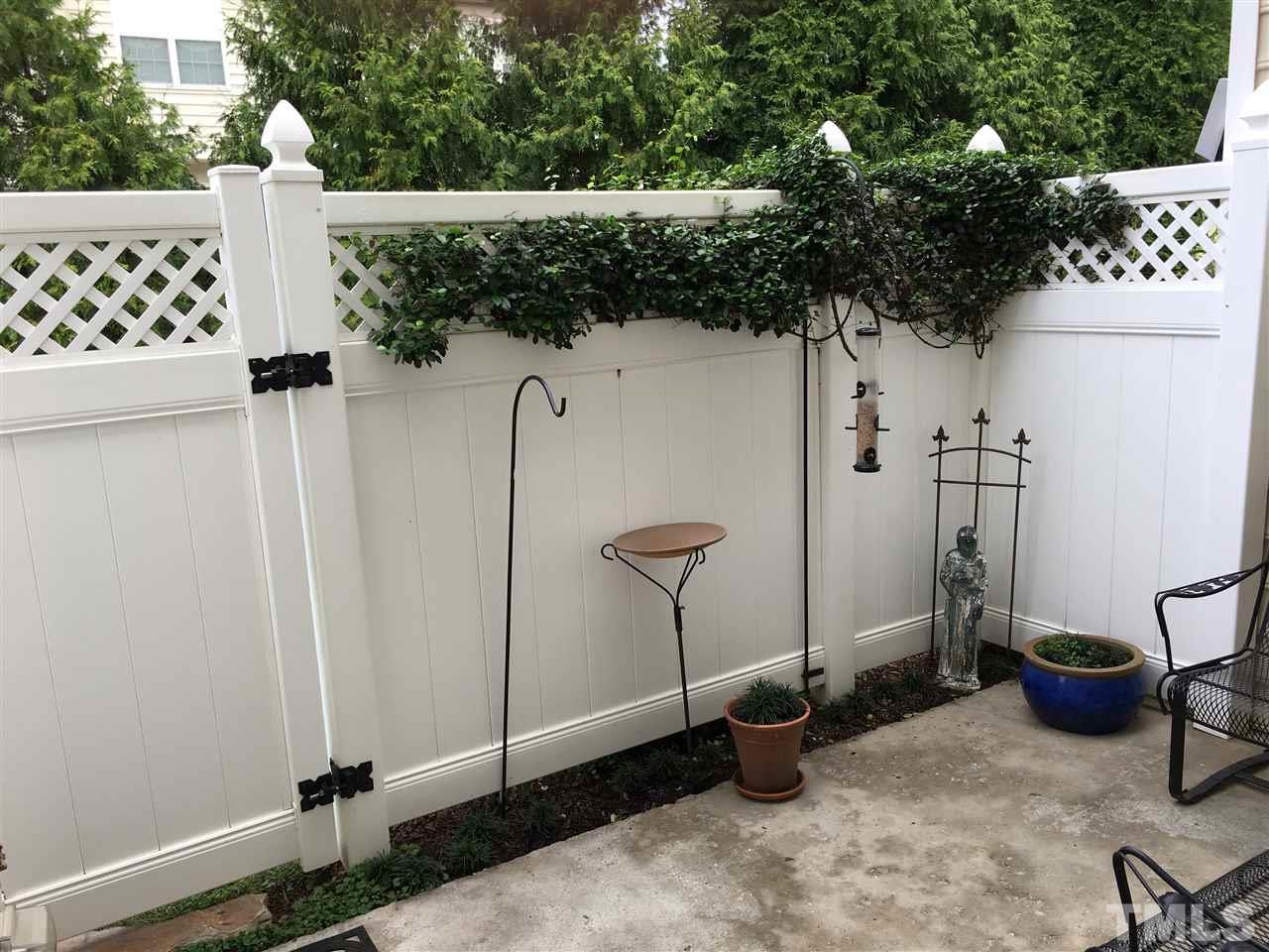 7634 Winners Edge Street Raleigh, NC 27617 - Photo 21 of 22 a view of a backyard with plants