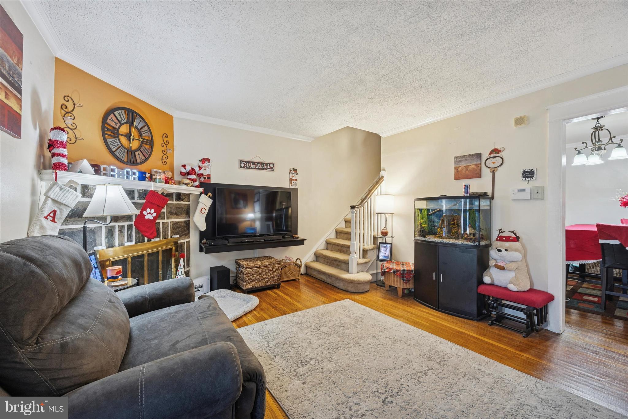 78 Marshall Road Lansdowne, PA 19050 - Photo 5 of 26 a living room with furniture and a flat screen tv