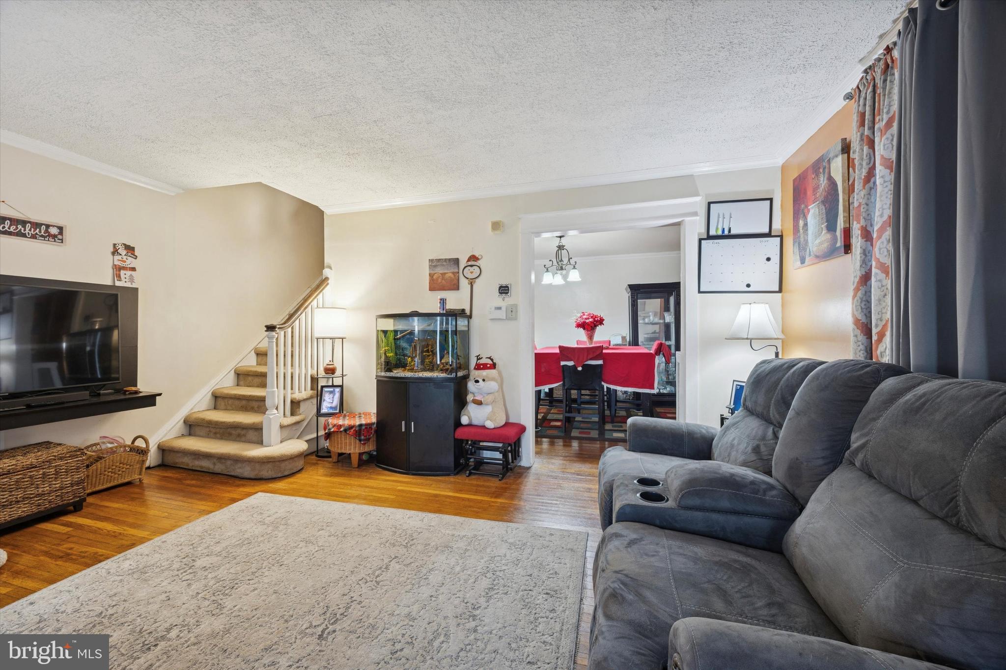 78 Marshall Road Lansdowne, PA 19050 - Photo 6 of 26 a living room with furniture and a flat screen tv