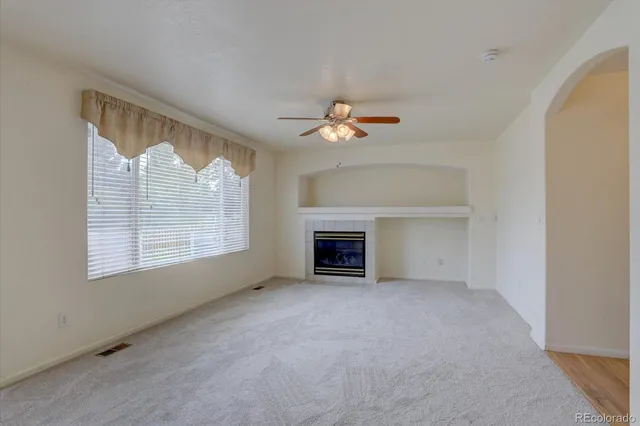 a view of a livingroom with a kitchen