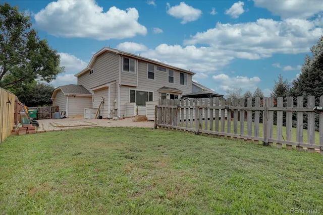 a view of a backyard with a garden
