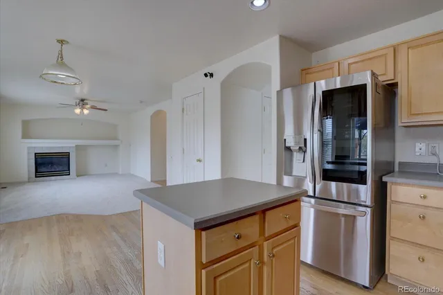 a kitchen with stainless steel appliances a stove sink and microwave