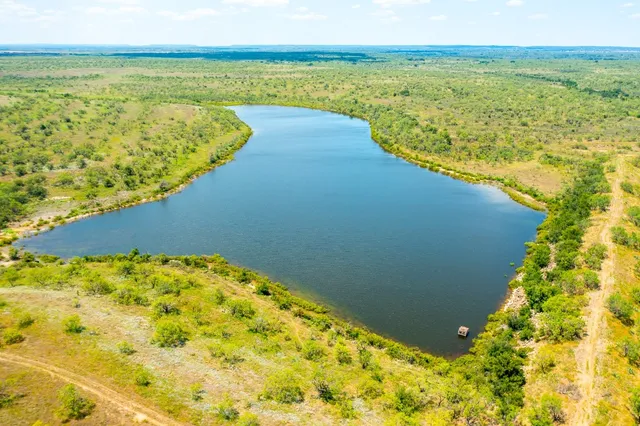 a view of an ocean and a mountain