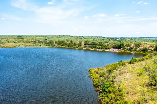 a view of an ocean and city