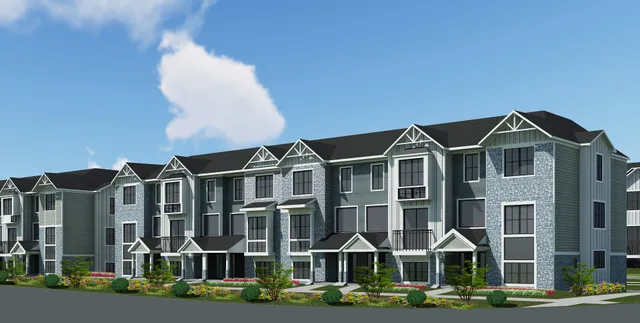 a front view of residential houses with street