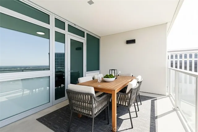 a view of a dining room with furniture and window