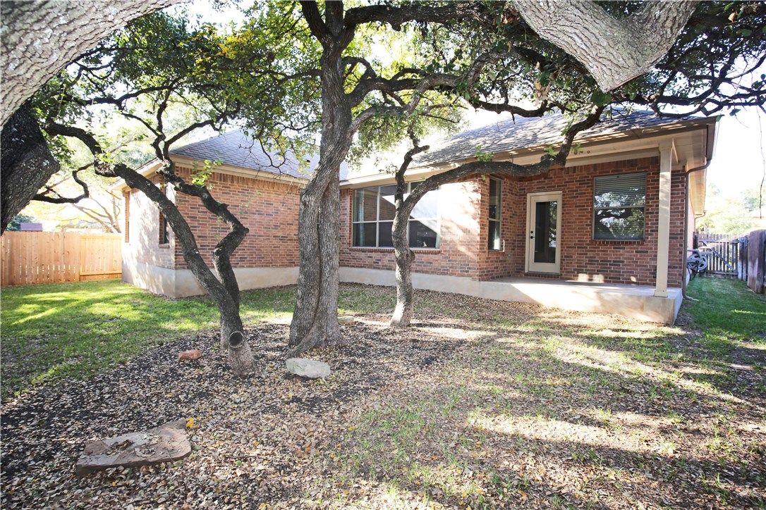 3921 Sapphire Loop Round Rock, TX 78681 - Photo 23 of 24 a view of a house with a yard