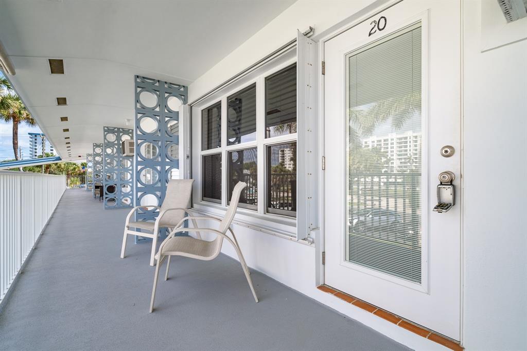 1110 North Riverside Drive, Unit 20 Pompano Beach, FL 33062 - Photo 22 of 32 a view of a livingroom with furniture and a window