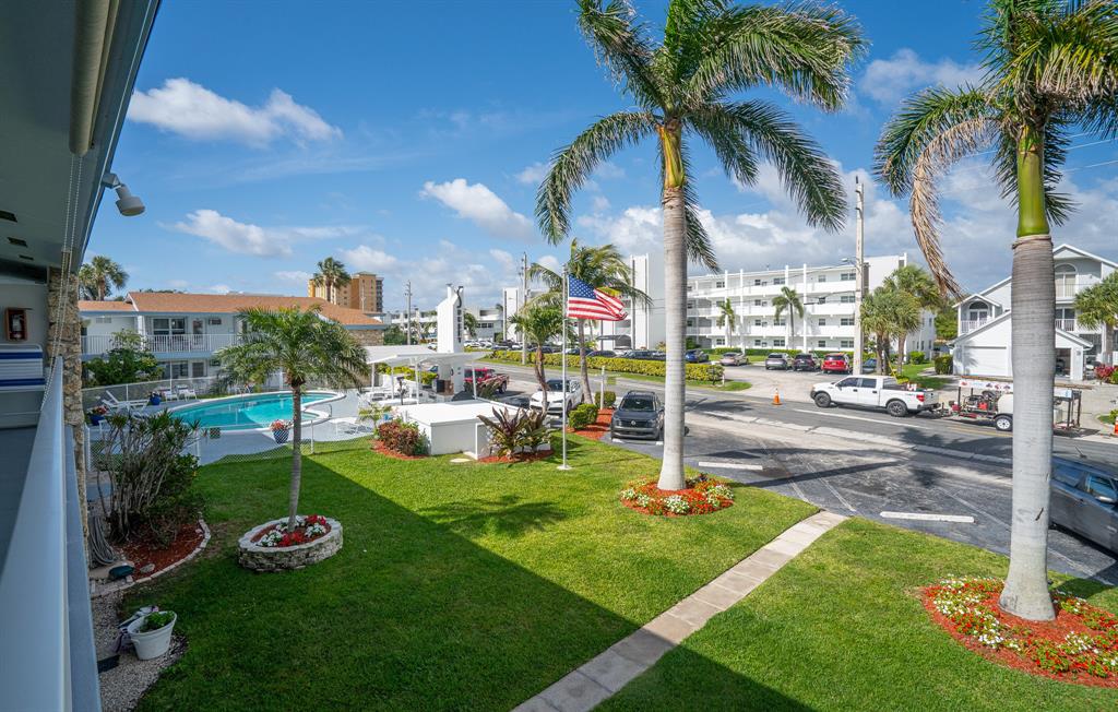 1110 North Riverside Drive, Unit 20 Pompano Beach, FL 33062 - Photo 10 of 32 a view of a park with big trees