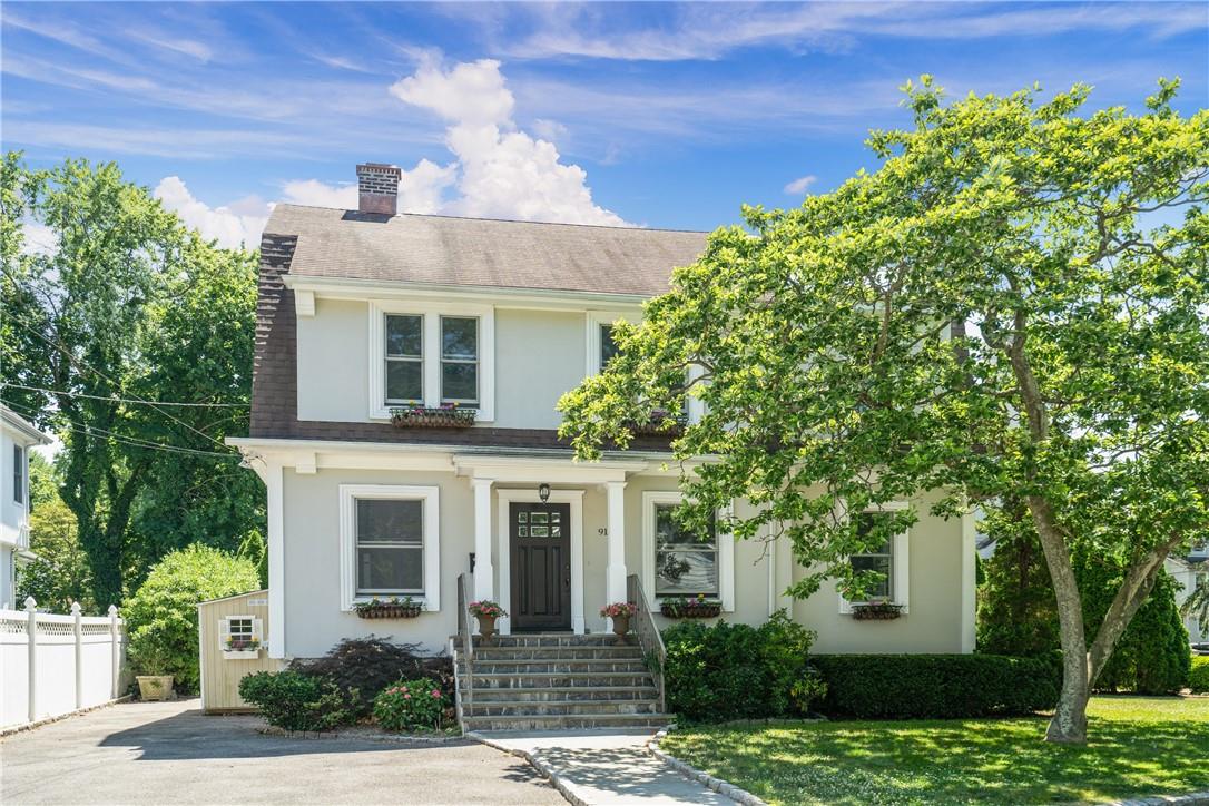 91 Grapal Street Rye, NY 10580 - Photo 1 of 1 a front view of a house with a yard