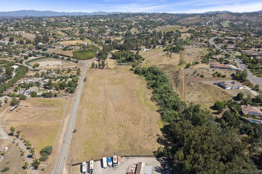 Via Monserate Bonsall Ca Fallbrook, CA 92028 - Photo 4 of 13 an aerial view of residential building and parking space
