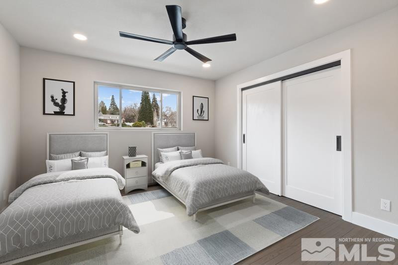 995 Skyline Boulevard Reno, NV 89509 - Photo 22 of 34 a bedroom with two beds and a painting