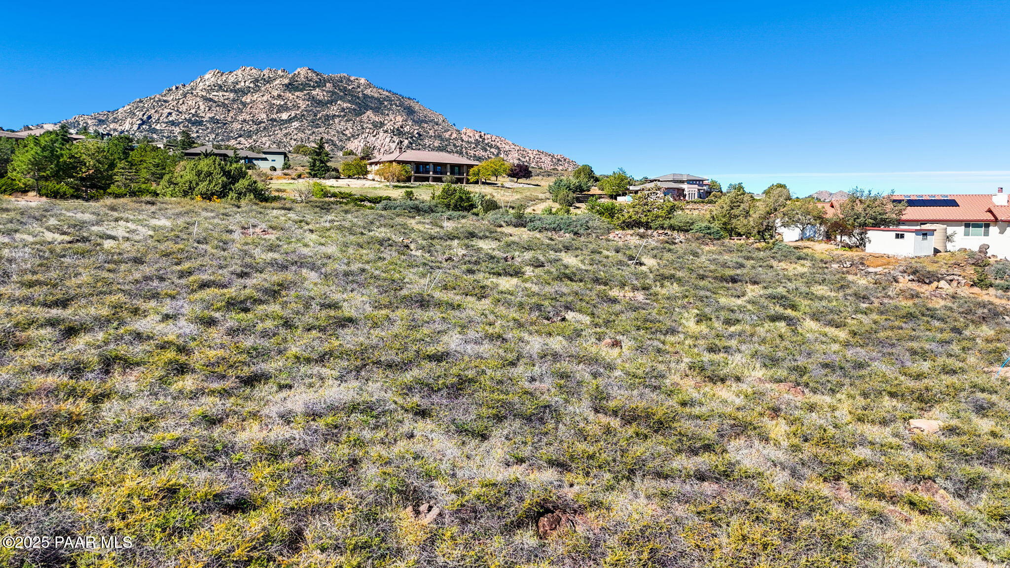 6614 North Shauna Drive Prescott, AZ 86305 - Photo 19 of 19 a view of a large building with a yard