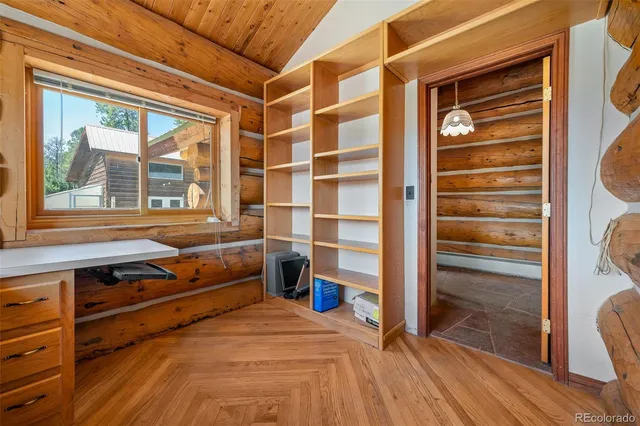 a kitchen with granite countertop a stove and a sink
