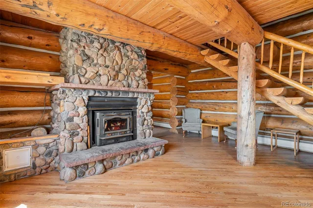 a view of a livingroom with furniture and wooden floor