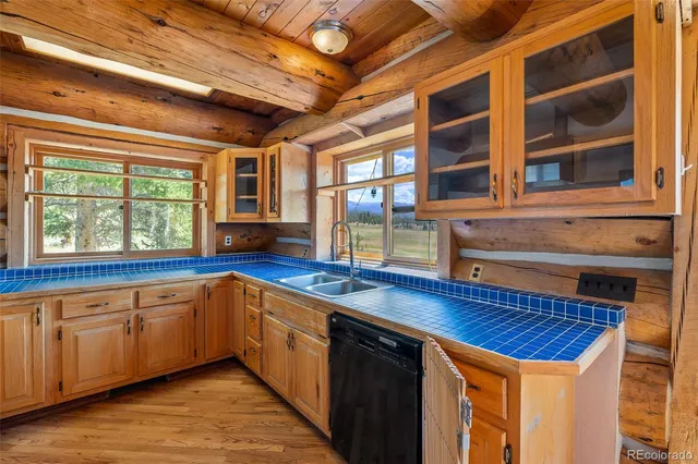 a view of a backyard with sitting area