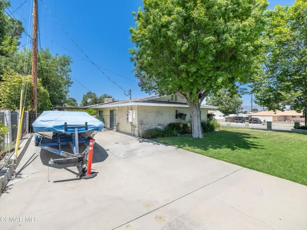 front view of a house with a patio