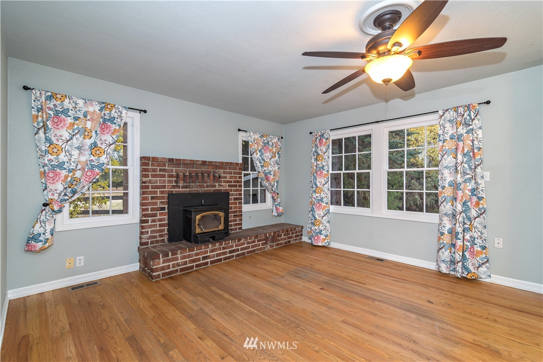 510 East Bender Road Ellensburg, WA 98926 - Photo 3 of 28 a view of an empty room with a window and fireplace