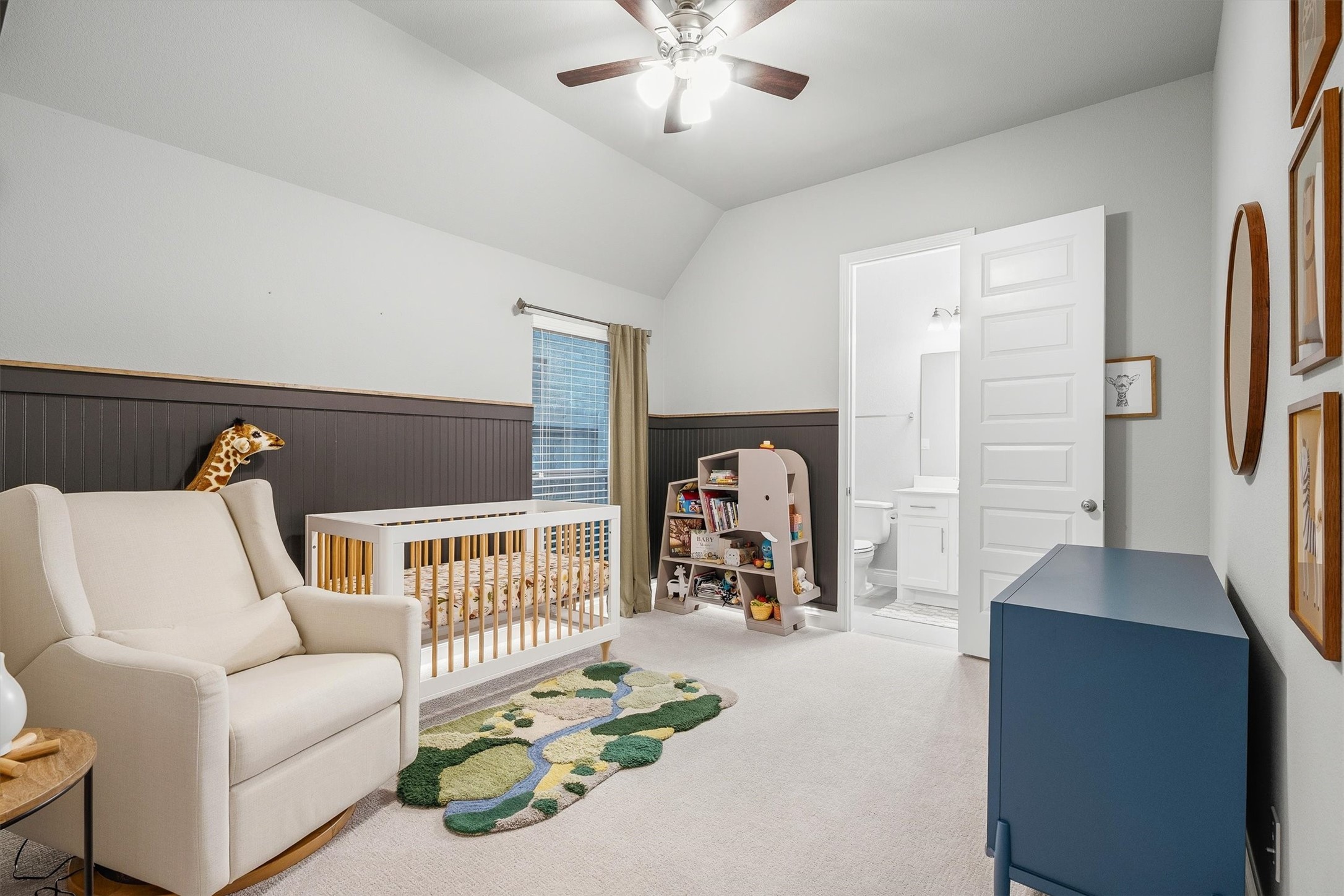 29118 Lantana Ridge Court Fulshear, TX 77441 - Photo 9 of 29 This bedroom suite boasts impressive high ceilings, warm carpet flooring, and a large window, delivering both charm and an open, inviting atmosphere.