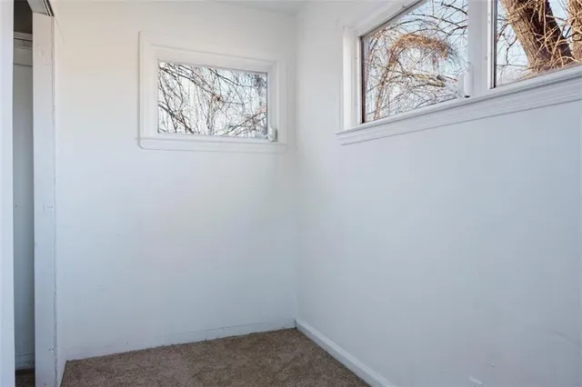 a small space with a window and a window
