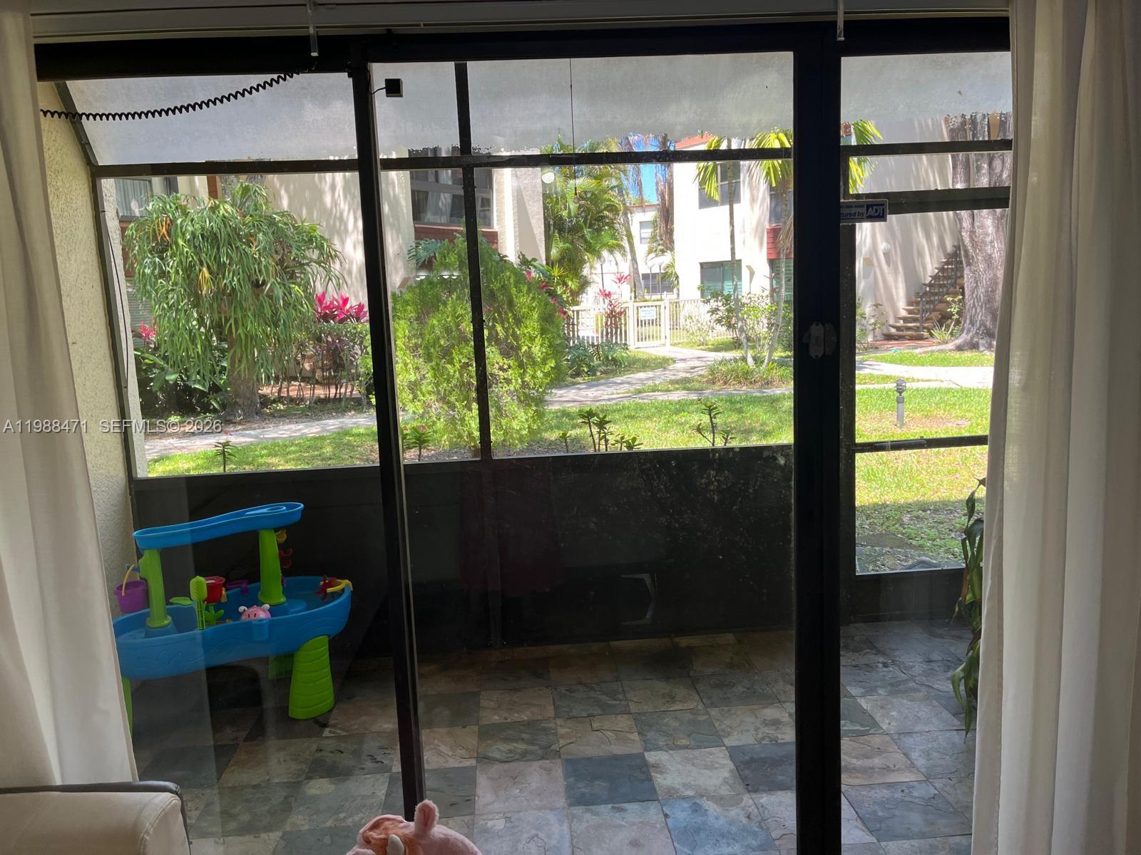 301 North Pine Island Road, Unit 156 Plantation, FL 33324 - Photo 12 of 16 a view of two chairs in balcony