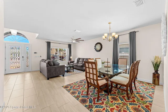 a view of a livingroom with furniture and window