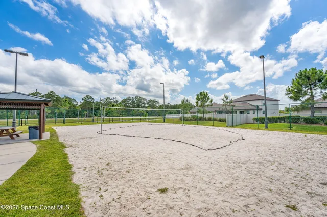 a view of swimming pool with a lake