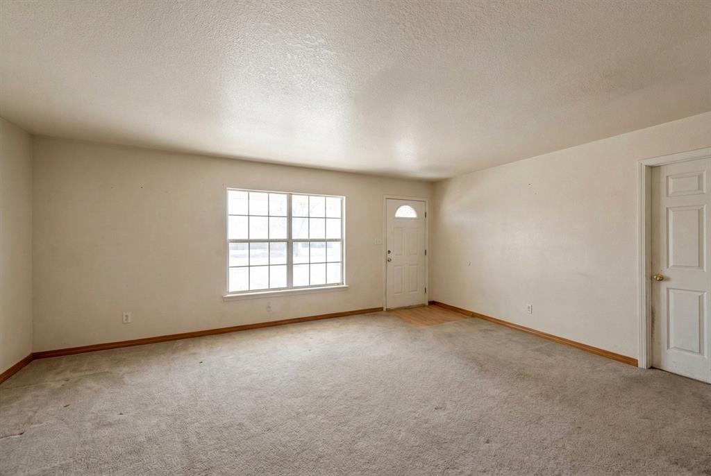5288 Ft Graham Road West, TX 76691 - Photo 6 of 19 an empty room with windows