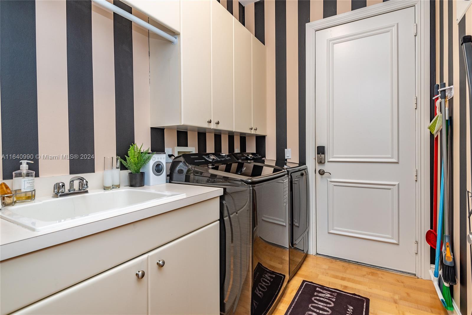 17586 Middlebrook Way Boca Raton, FL 33496 - Photo 31 of 86 a bathroom with a sink and a mirror