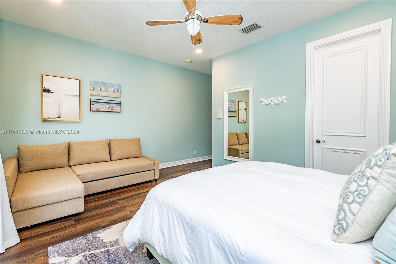 17586 Middlebrook Way Boca Raton, FL 33496 - Photo 42 of 86 a bedroom with a large bed couch and a window