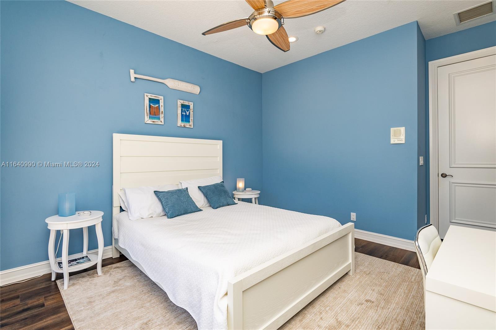 17586 Middlebrook Way Boca Raton, FL 33496 - Photo 44 of 86 a bed room with a bed and a ceiling fan