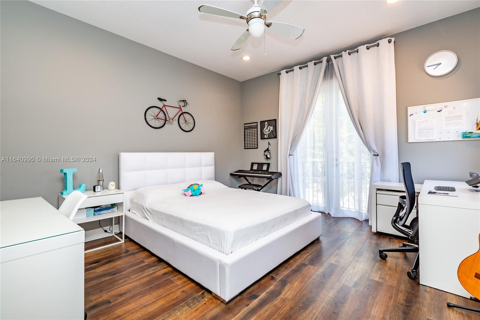 17586 Middlebrook Way Boca Raton, FL 33496 - Photo 54 of 86 a bedroom with a bed and a table