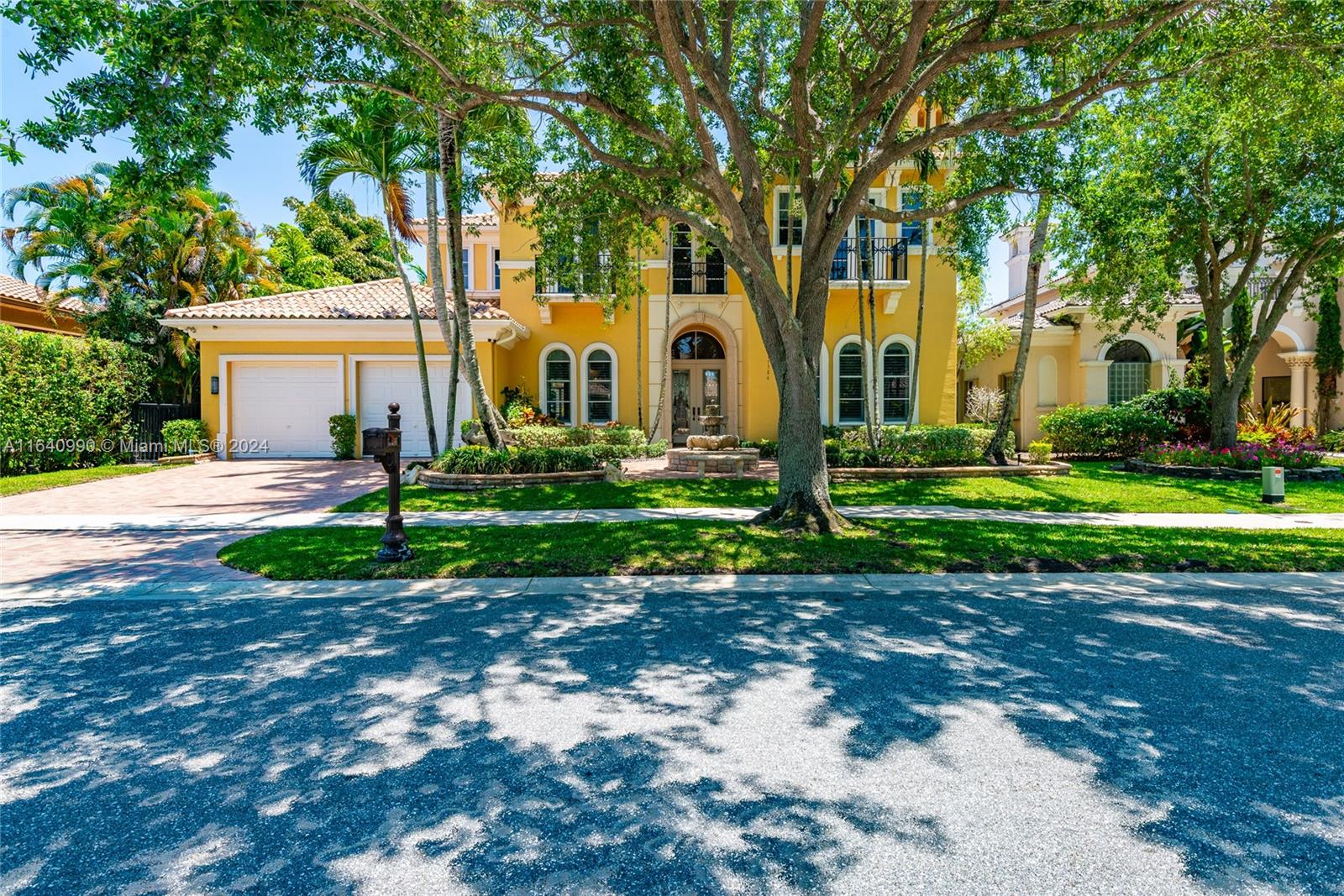 17586 Middlebrook Way Boca Raton, FL 33496 - Photo 66 of 86 a front view of a house with a yard