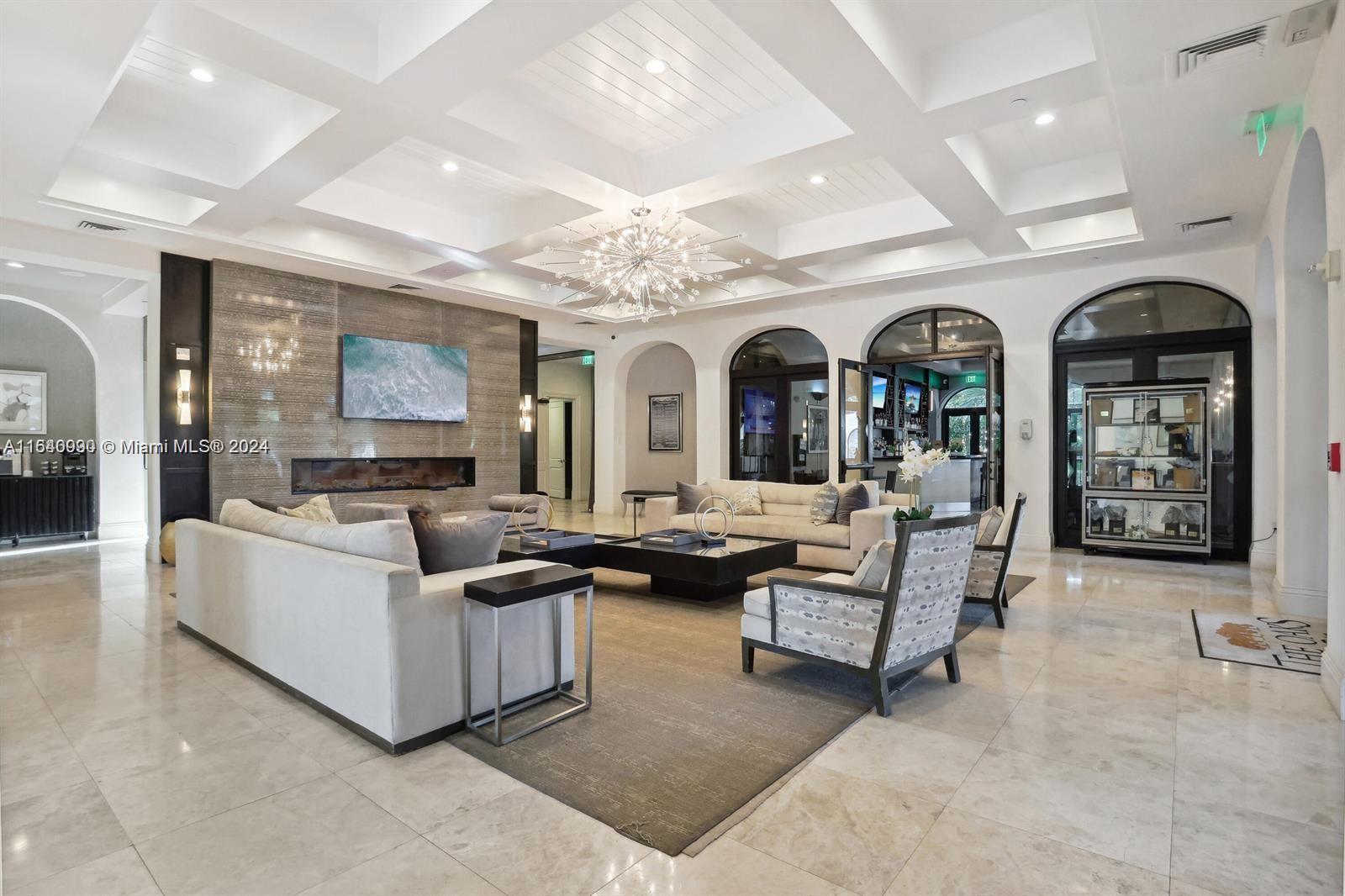 17586 Middlebrook Way Boca Raton, FL 33496 - Photo 75 of 86 a living room with fireplace furniture and a view of kitchen