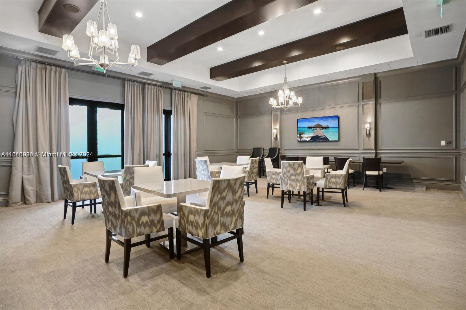 17586 Middlebrook Way Boca Raton, FL 33496 - Photo 84 of 86 a view of a dining room with furniture and chandelier