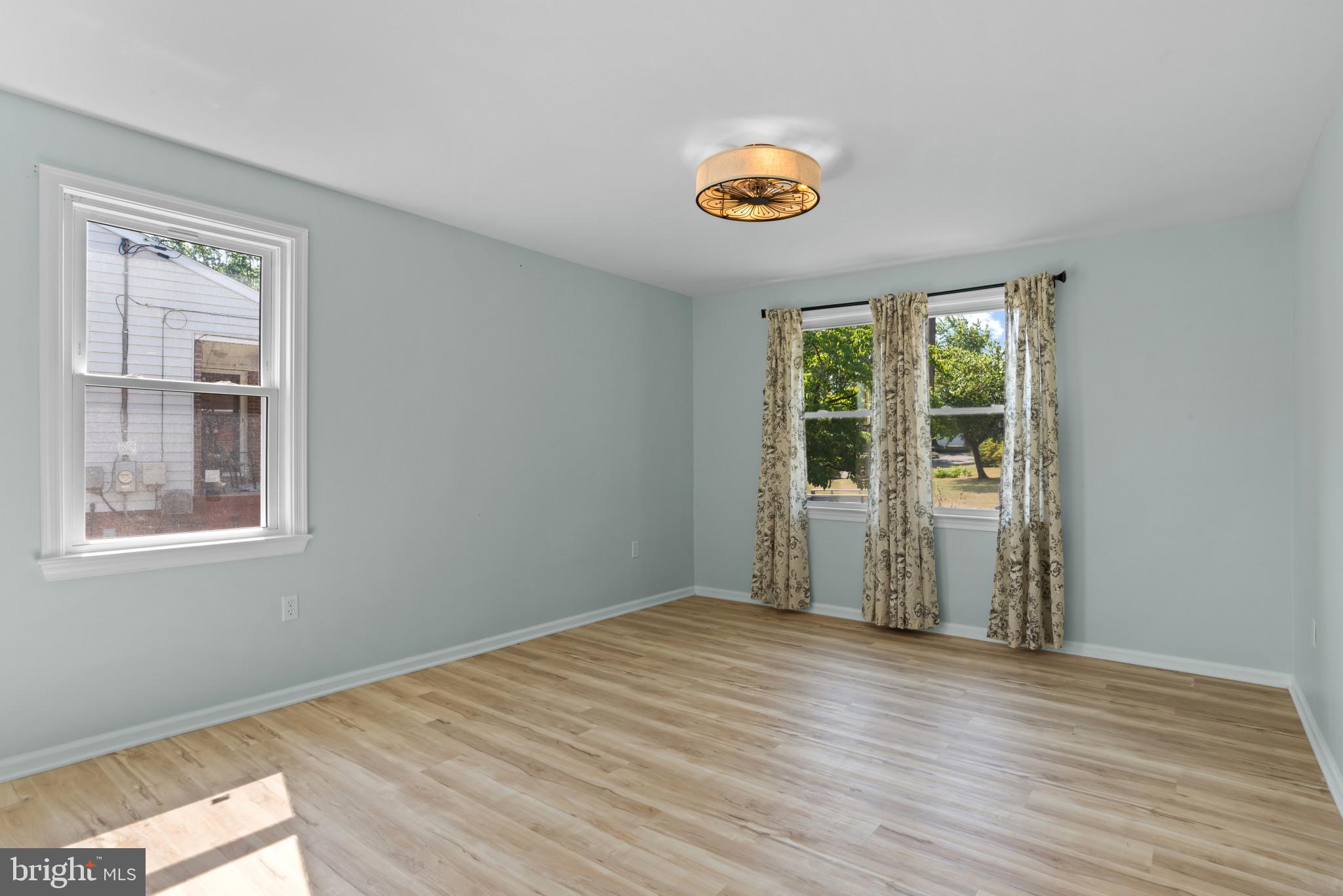 14 Sharon Road Enola, PA 17025 - Photo 14 of 40 Bedroom featuring wood-finish flooring, light blue