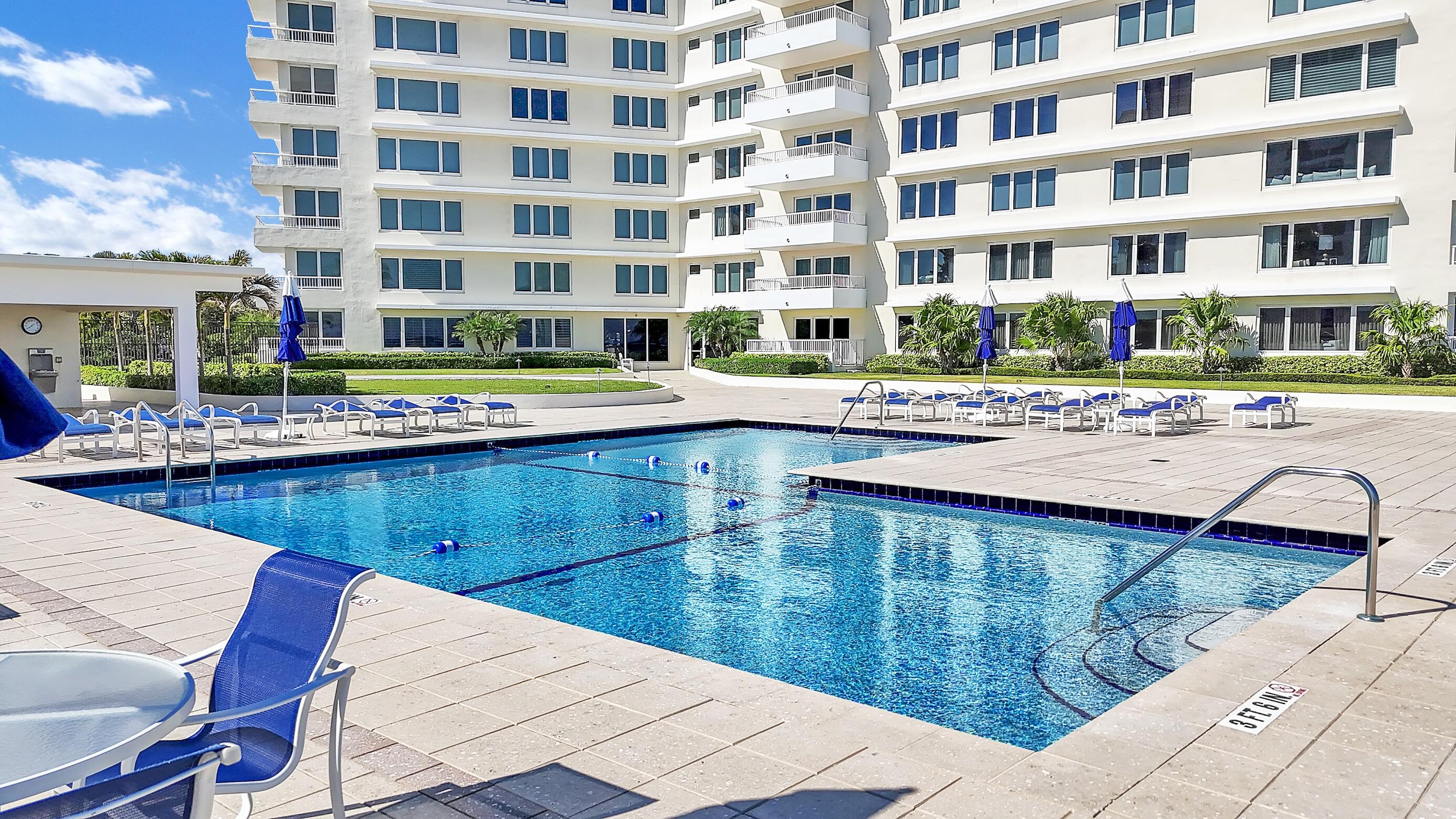 600 South Ocean Boulevard, Unit 802 Boca Raton, FL 33432 - Photo 11 of 27 a view of a swimming pool with outdoor seating