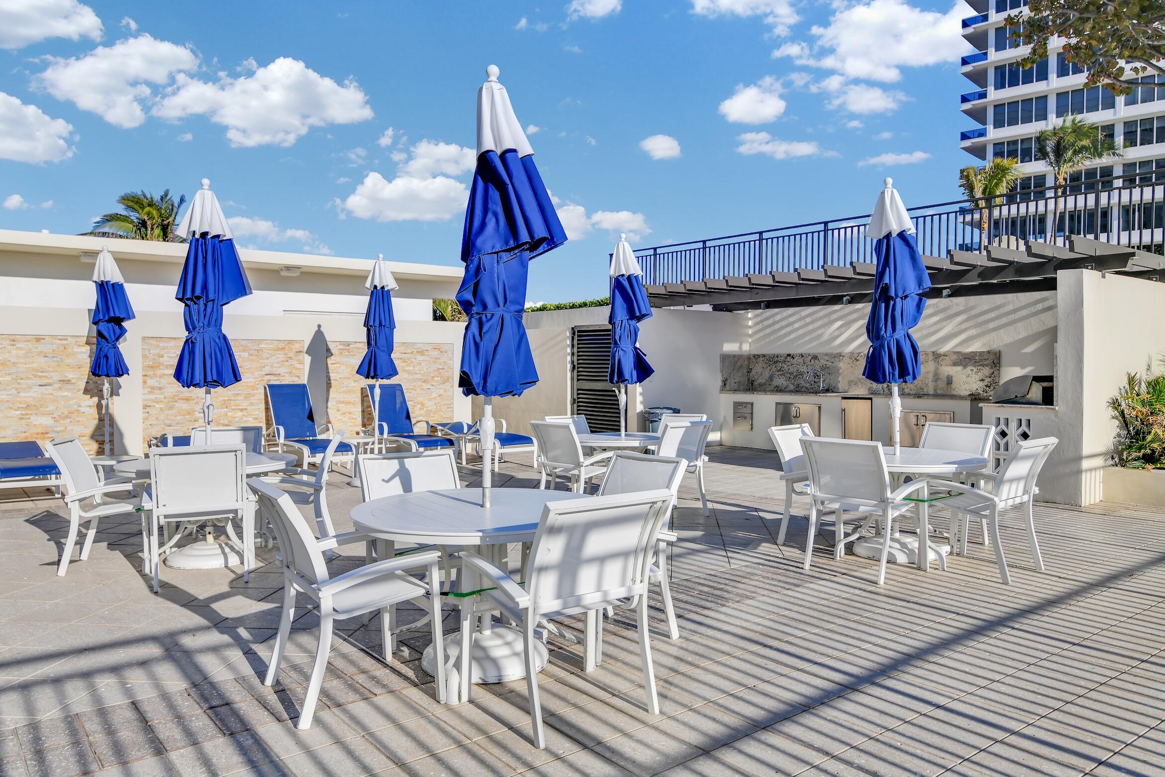 600 South Ocean Boulevard, Unit 802 Boca Raton, FL 33432 - Photo 13 of 27 a view of a dining hall with many windows