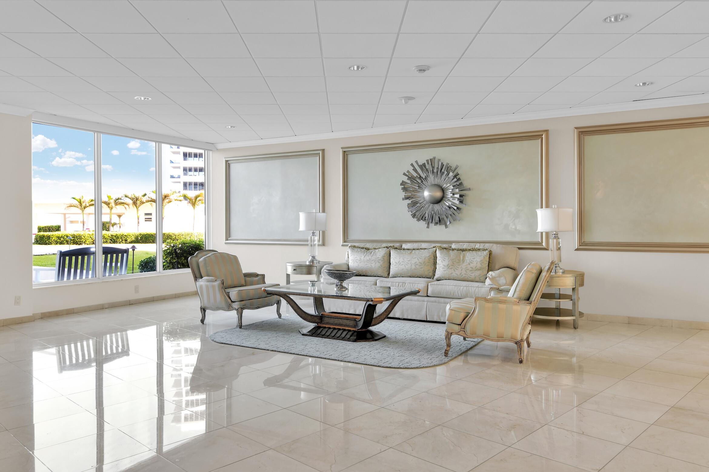 600 South Ocean Boulevard, Unit 802 Boca Raton, FL 33432 - Photo 17 of 27 a living room with furniture and a large window