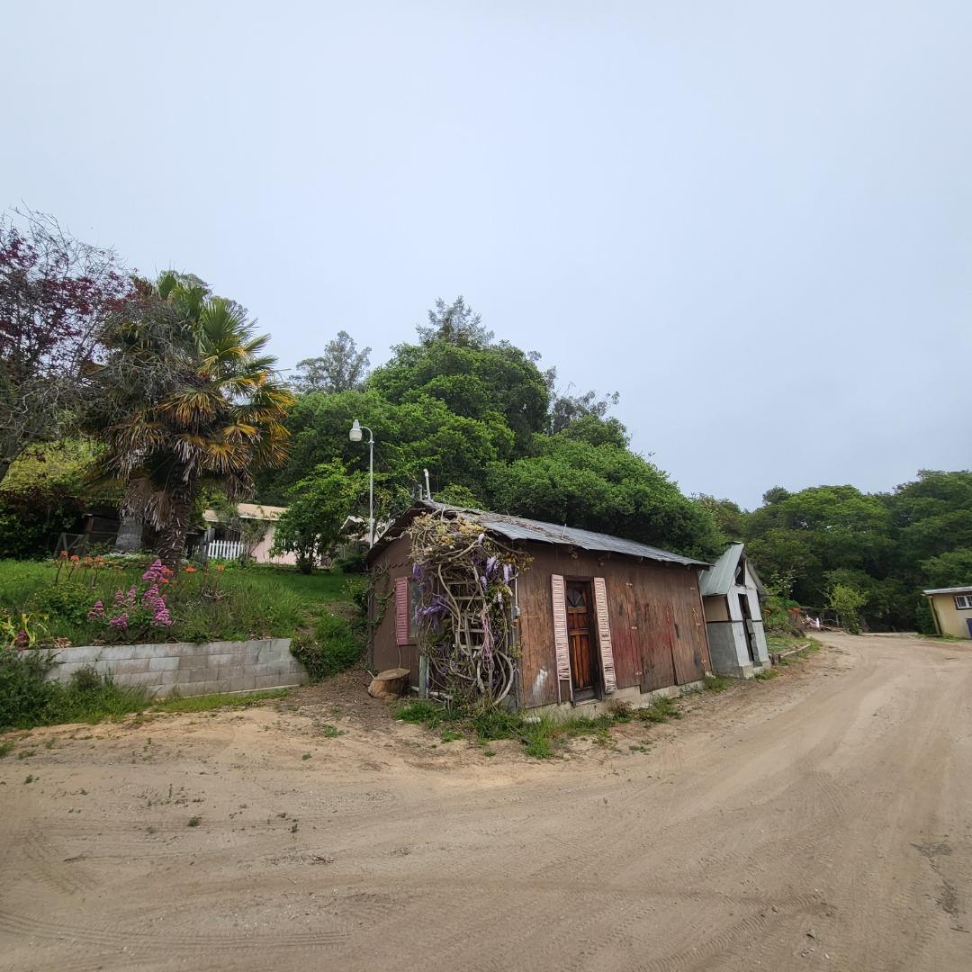 159 Strawberry Road Watsonville, CA 95076 - Photo 17 of 109 a view of a barn in the middle of a yard