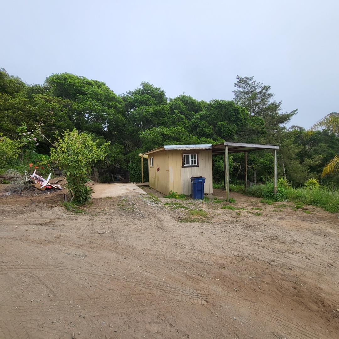 159 Strawberry Road Watsonville, CA 95076 - Photo 22 of 109 a view of a house with a yard and a garage