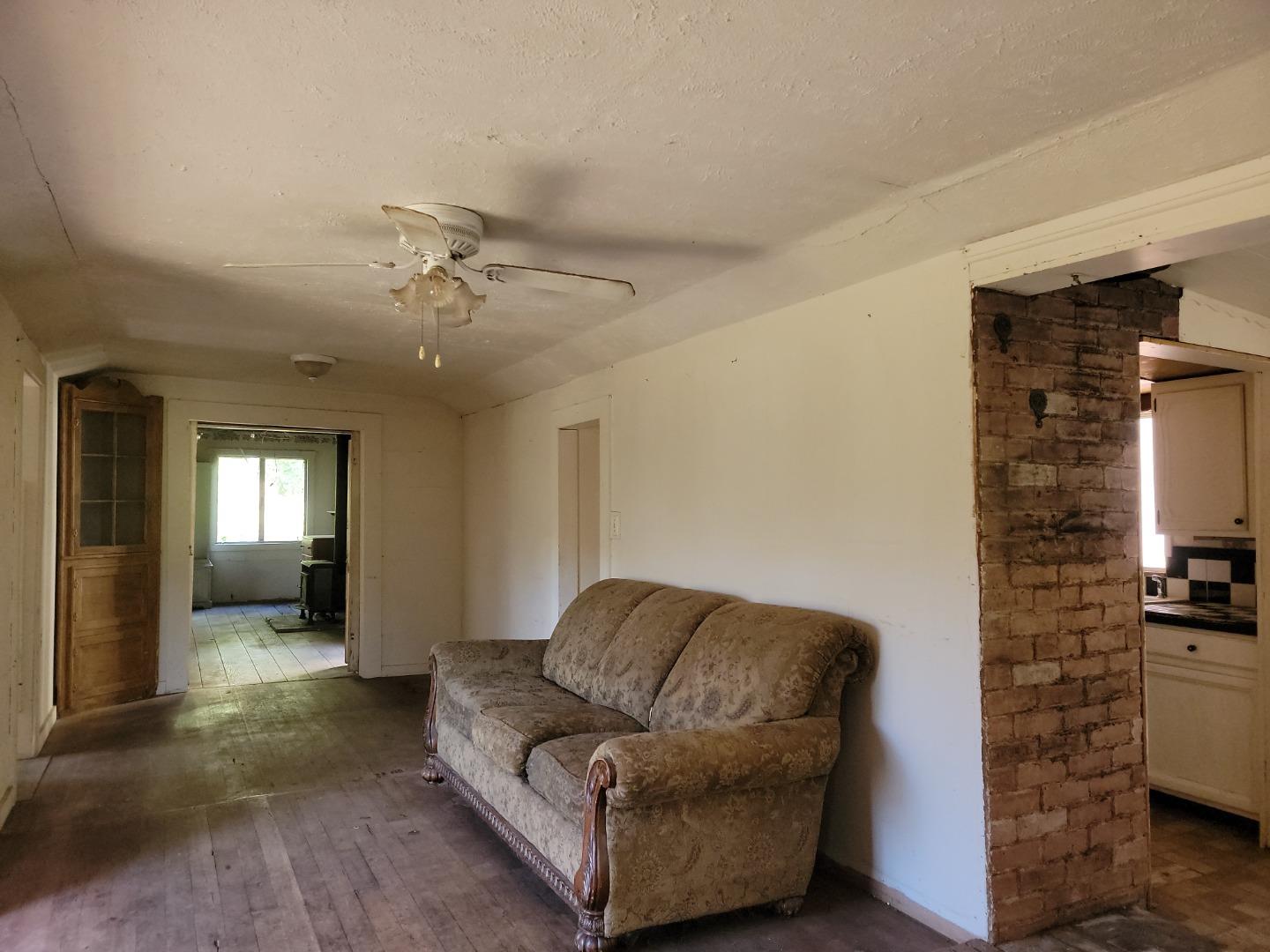 159 Strawberry Road Watsonville, CA 95076 - Photo 42 of 109 a living room with furniture and a ceiling fan