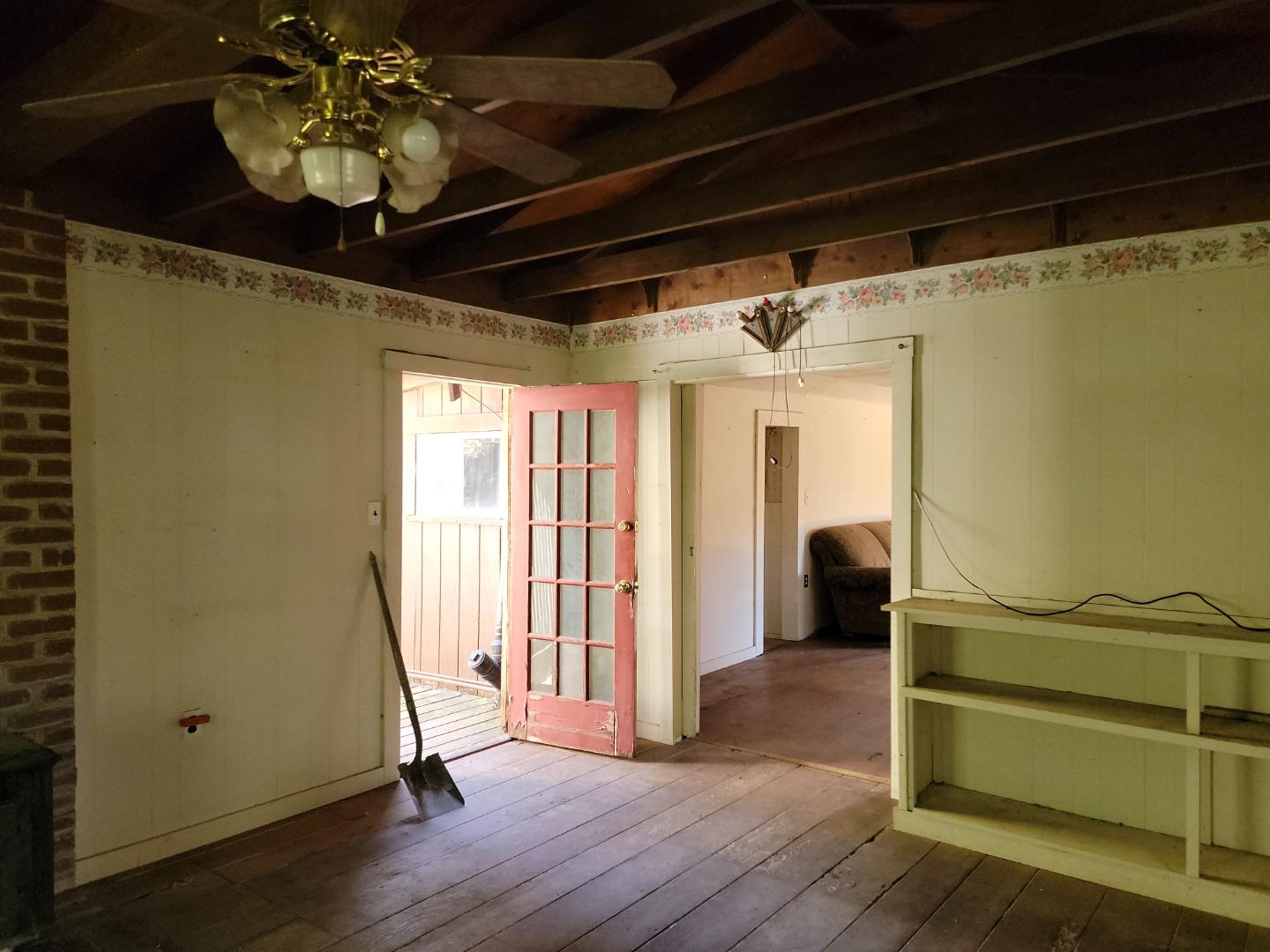 159 Strawberry Road Watsonville, CA 95076 - Photo 63 of 109 a view of a room with wooden floor and stairs
