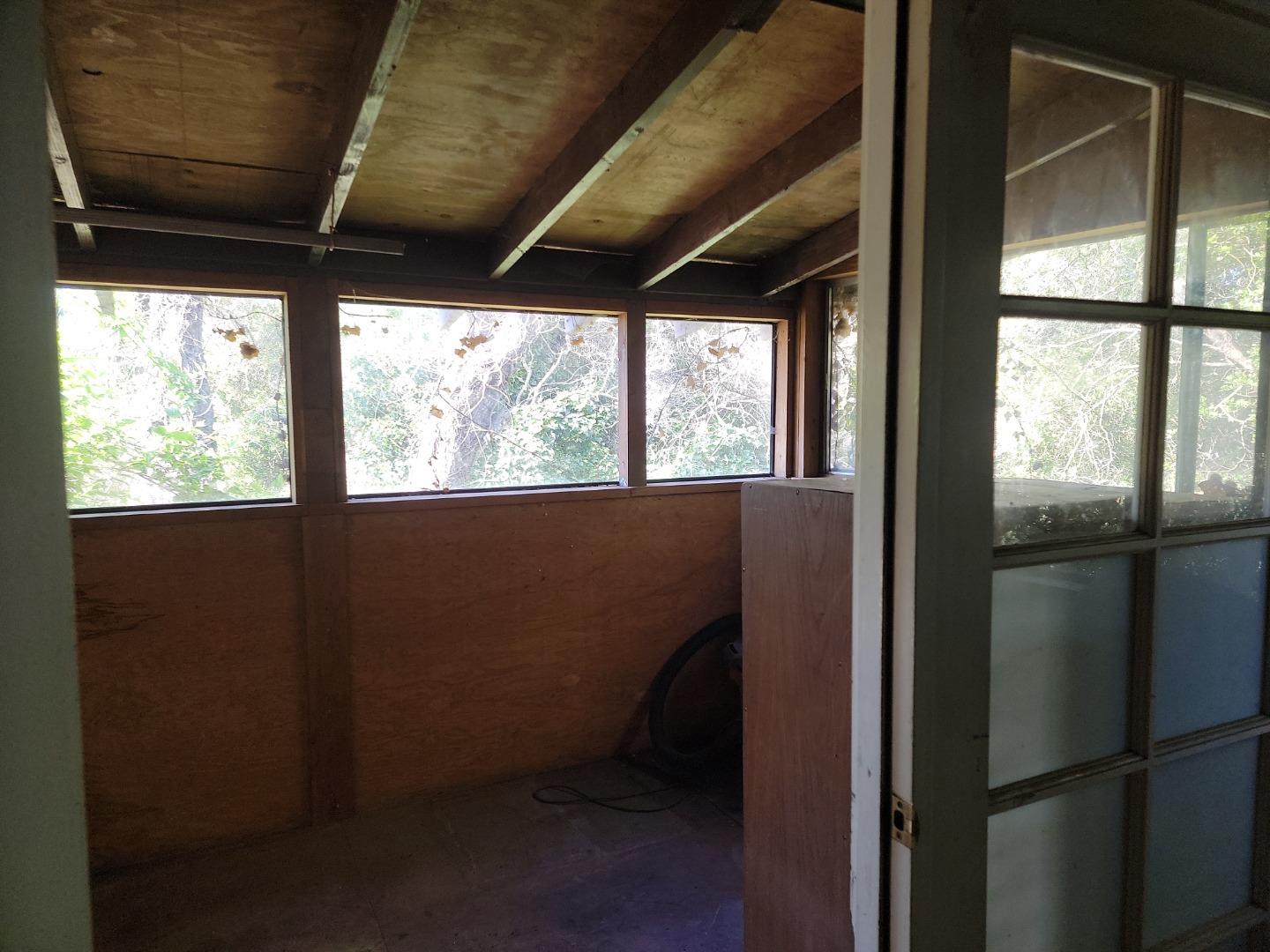 159 Strawberry Road Watsonville, CA 95076 - Photo 66 of 109 a view of empty room with large windows